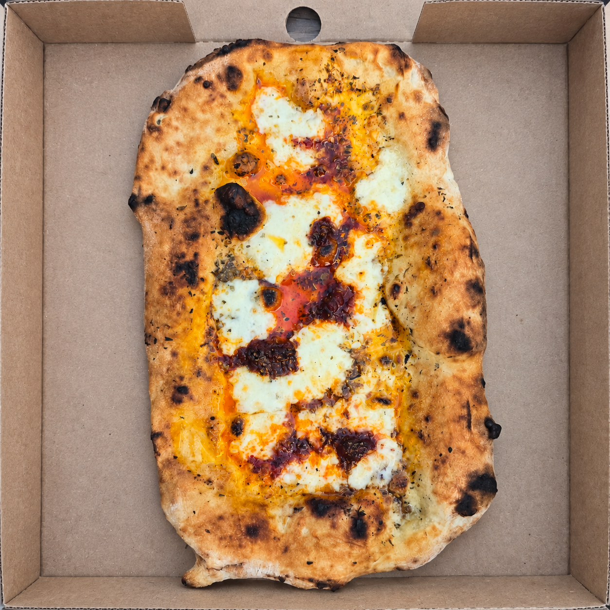 ’Nduja and chilli cheesy garlic bread with Fior di Latte, garlic, herbs and chilli flakes
